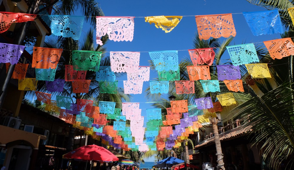 Colourful flags on the main street in Sayulita