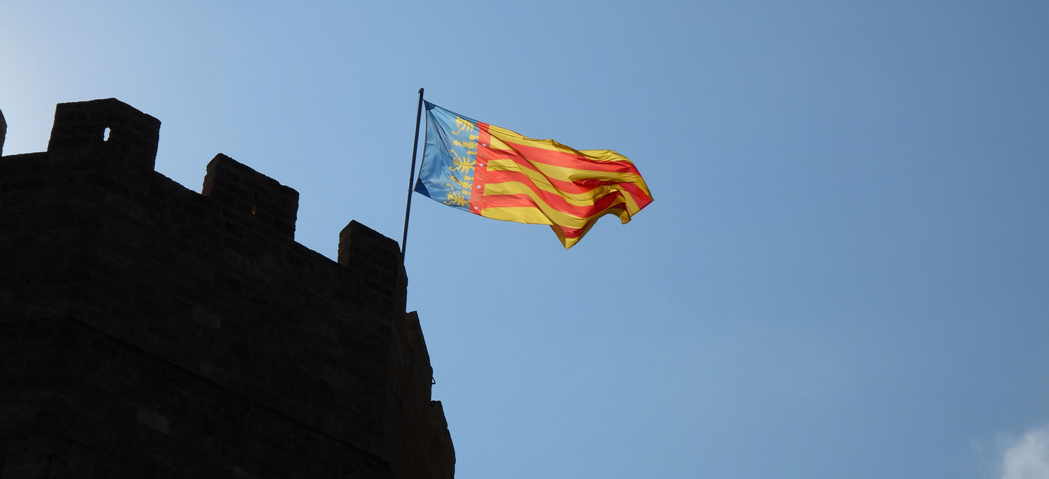 The Valencian flag flying from the 14th century Torres de Serranos