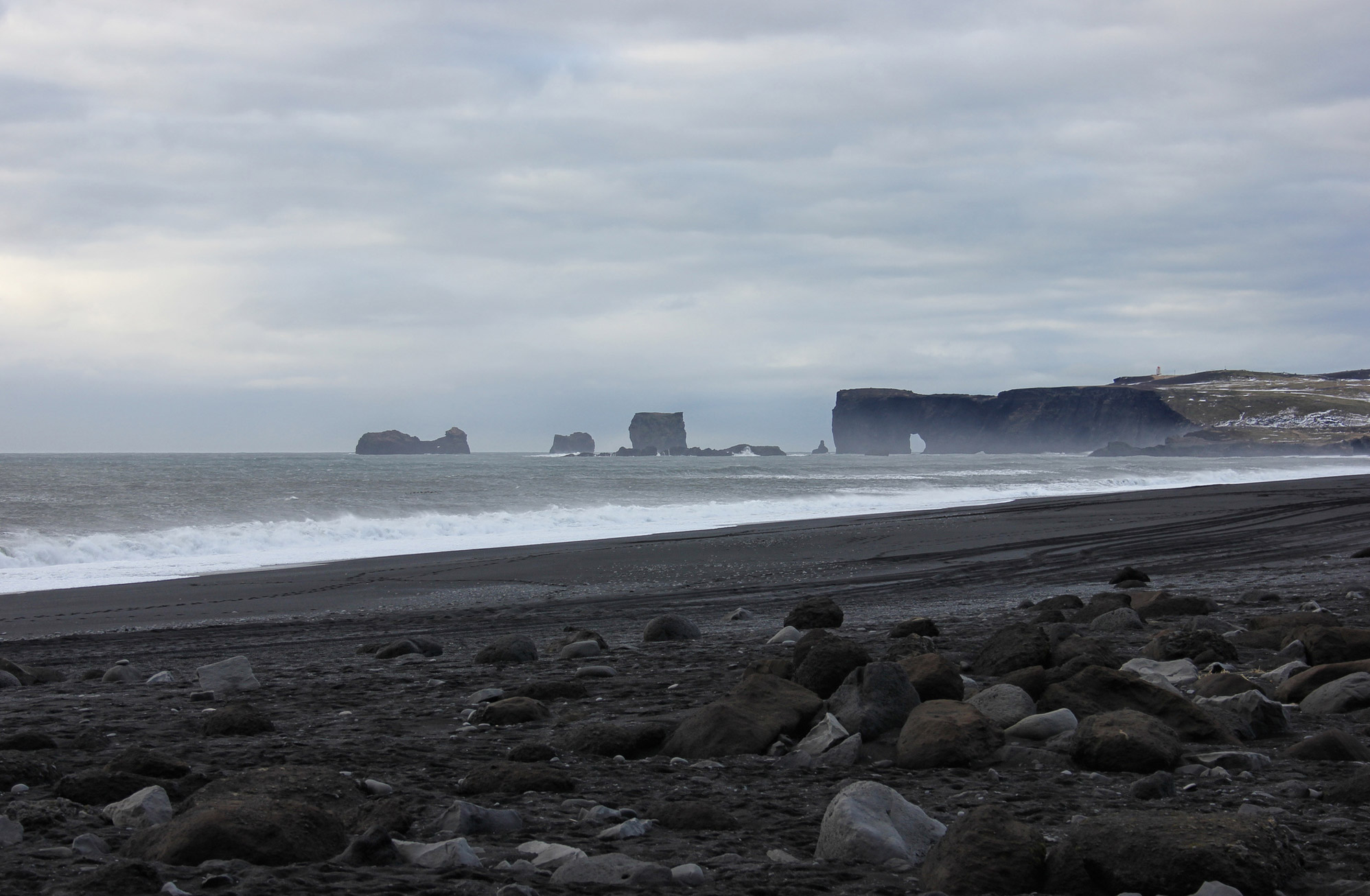 Looking back along the beach towards Dyrhólaey Arch