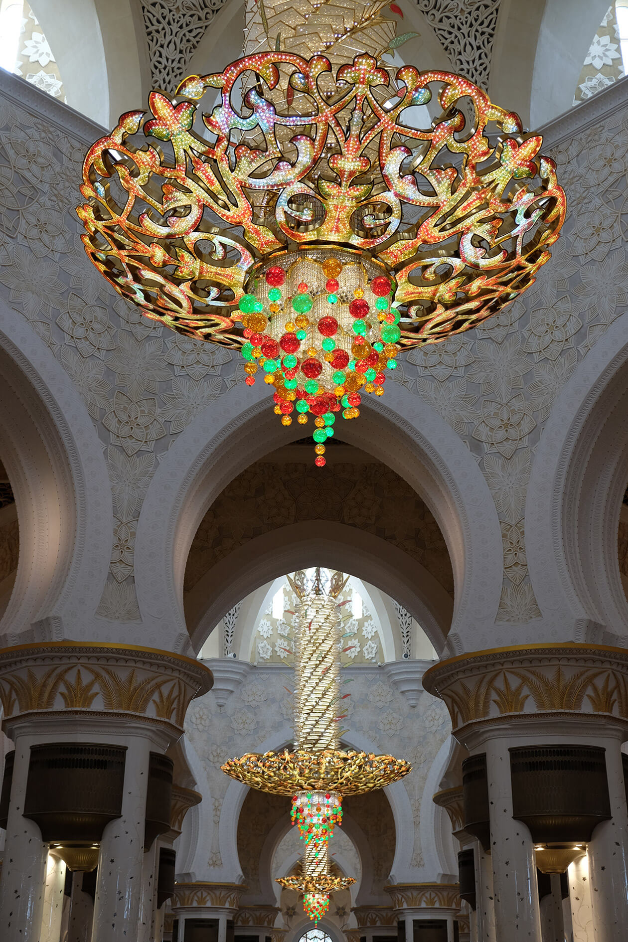The chandeliers are some of the largest in a mosque. The biggest one weighs 12 tons.