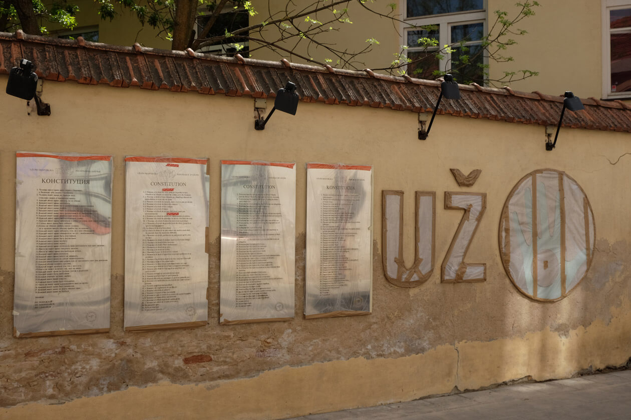 Uzupis's constitution is displayed on this wall in multiple languages