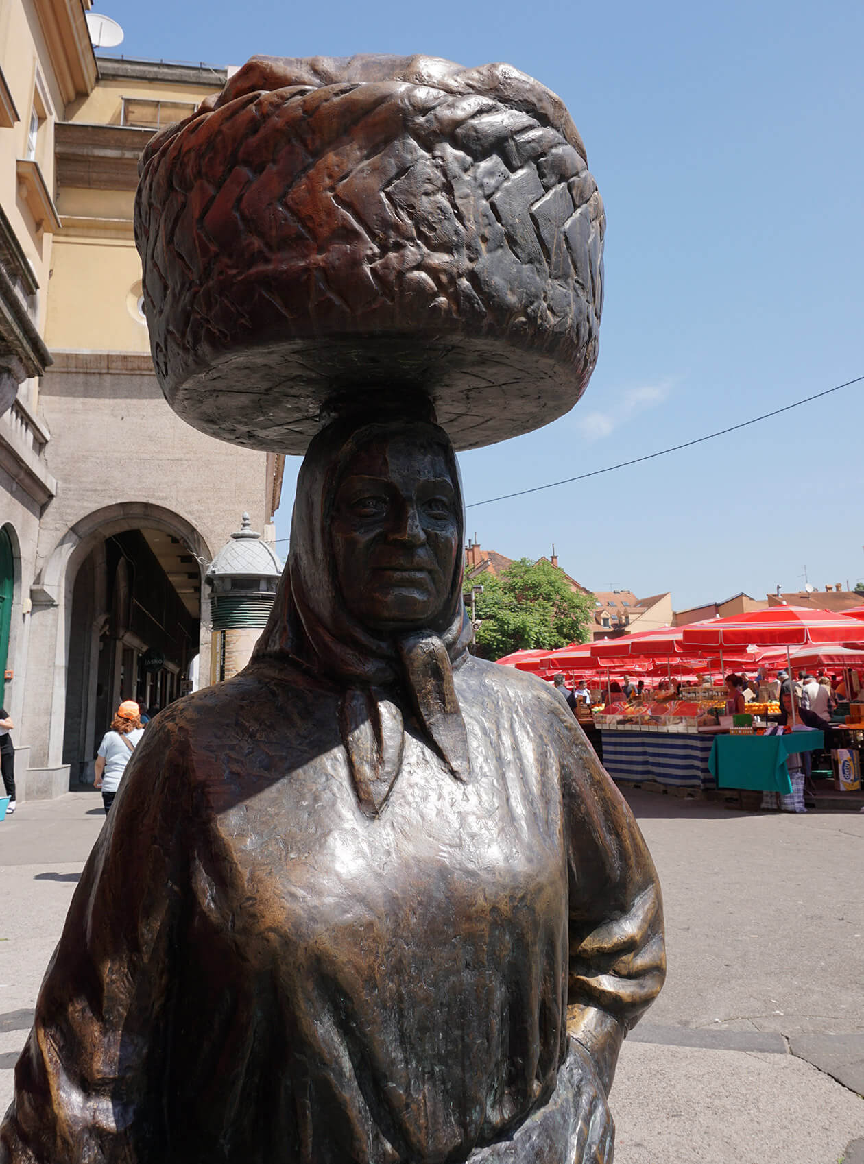 A statue of a market trader in Dolac market, Zagreb
