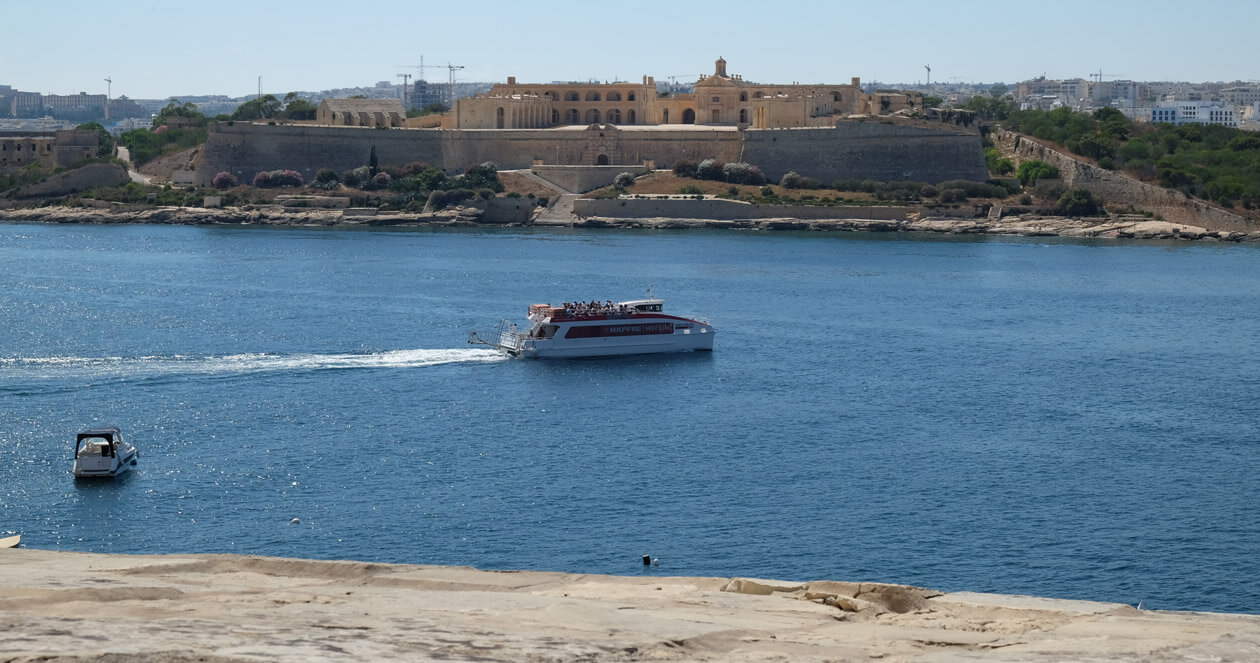The Sliema ferry passing Fort Manoel