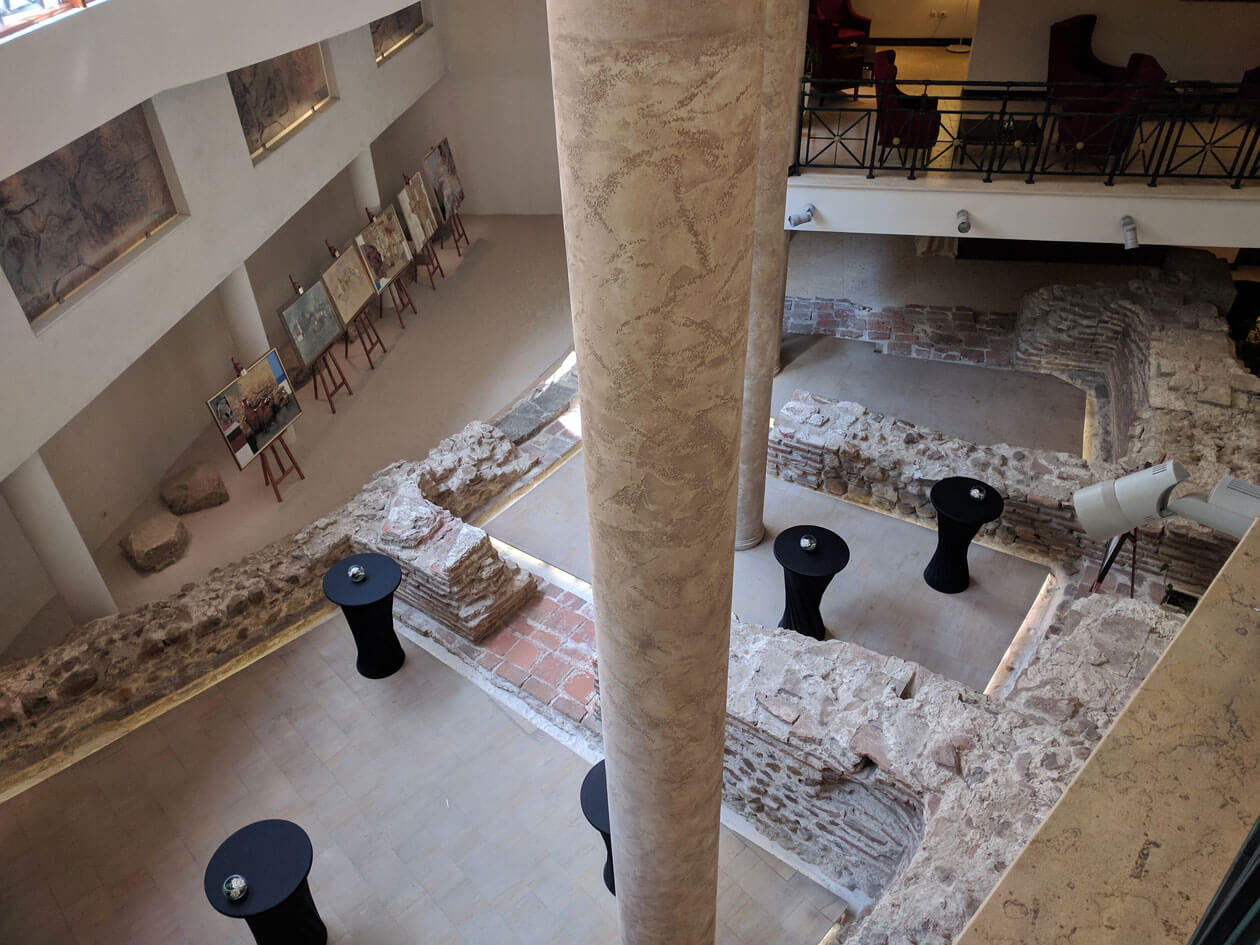 The Roman amphitheatre hidden inside a modern hotel