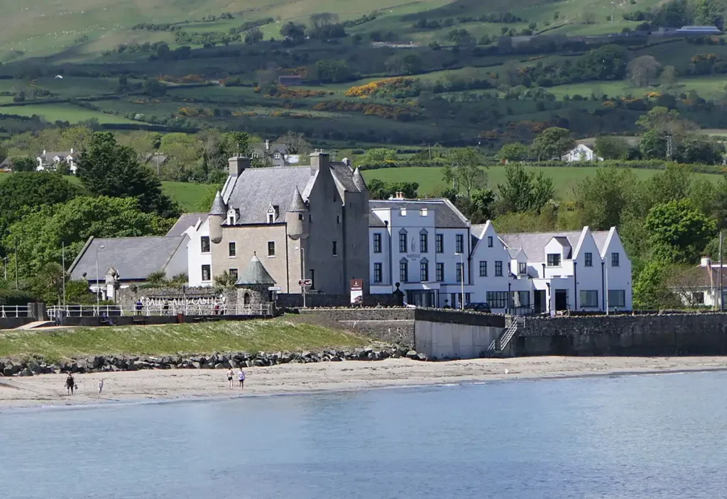 A large, Scottish style castle on the beach on the Causeway Coastal Route in Northern Ireland