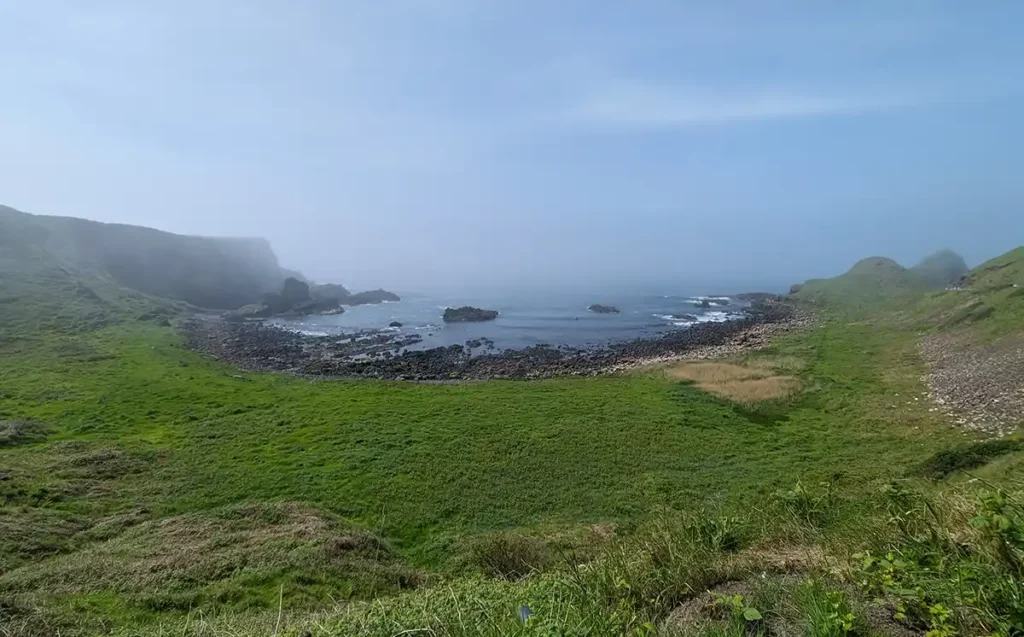 The Bay of Cows, with the twin humps of the Great Stookan rocks to the right hand side.