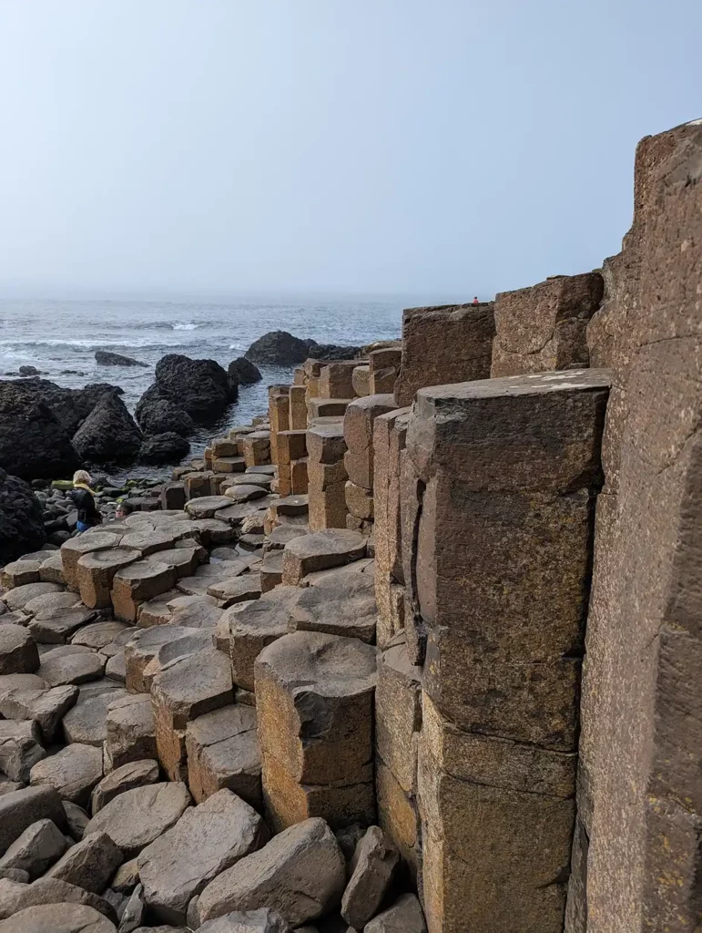 Hexagonal basalt columns stretching out to the sea