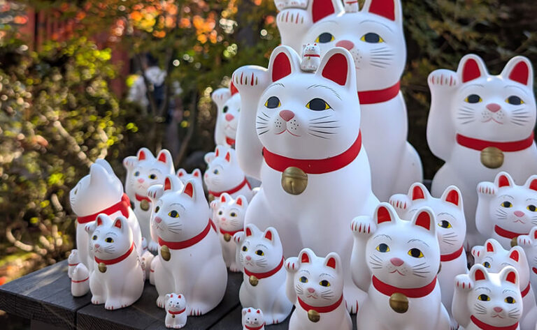 Lucky cat ceramic figures at Gōtokuji Temple in Tokyo