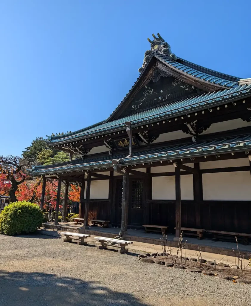 Butsu-Den is an old, dark wood building in a traditional style