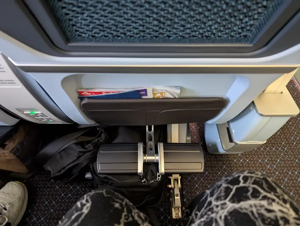 A footrest at an airline seat