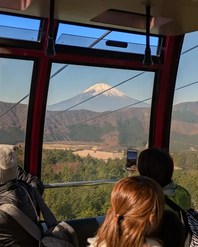 Looking out at Mount Fuji from one of the ropeway gondola cars. 