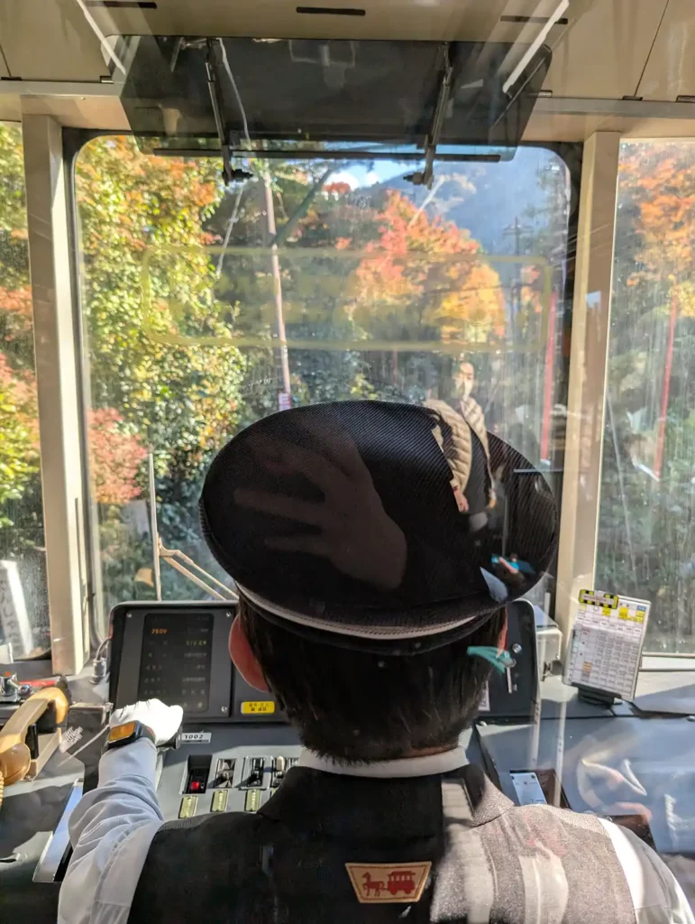 A rear view of the driver on a Hakone Tozan train.