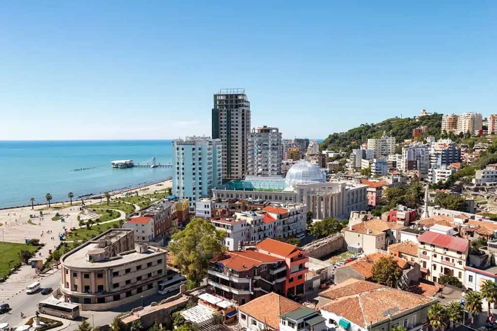 A large seaside city, with blue sea