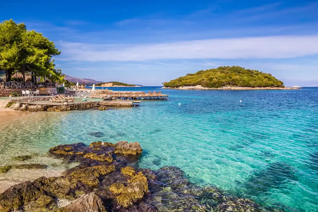 A beautiful coastline with clear water and blue skies