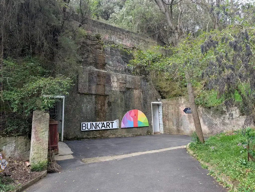 The entrance to Bunk'Art 1 is just a little door in what looks like a sheer rock face