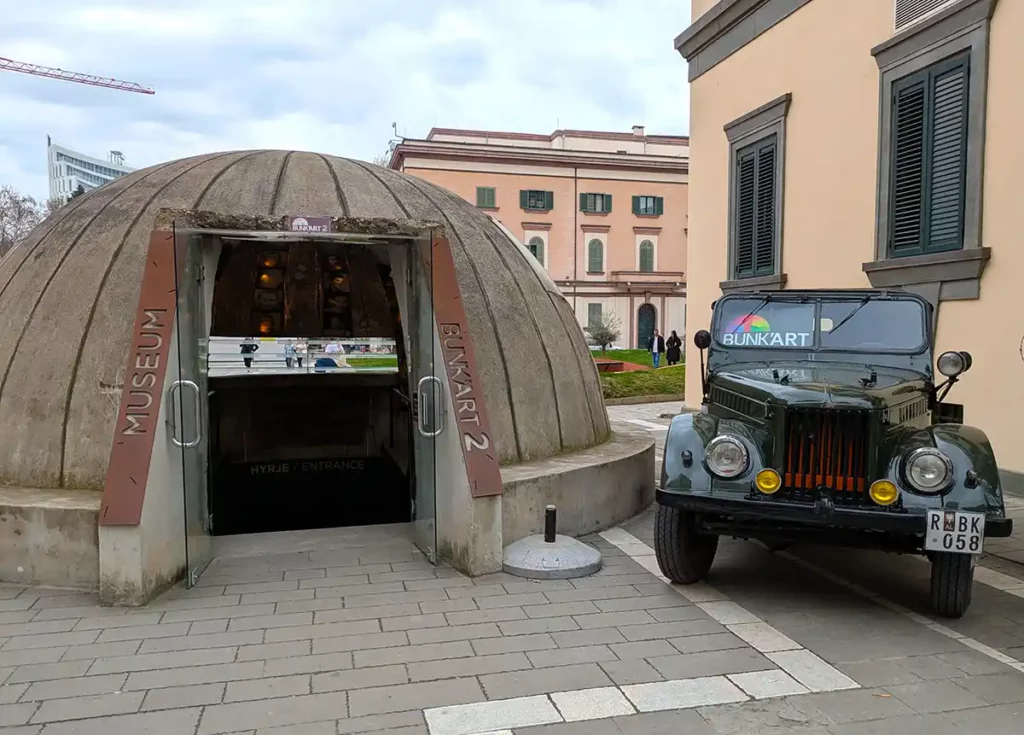 A bunker and military vehicle at the entrance to Bunk'Art 2 in Tirana